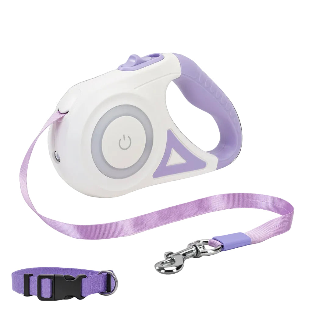 A retractable pet leash with a white and lavender plastic body, a matching lavender strap, and a silver metal clasp, shown on a transparent checkered background. A separate purple collar with a black buckle is also shown in the lower left.